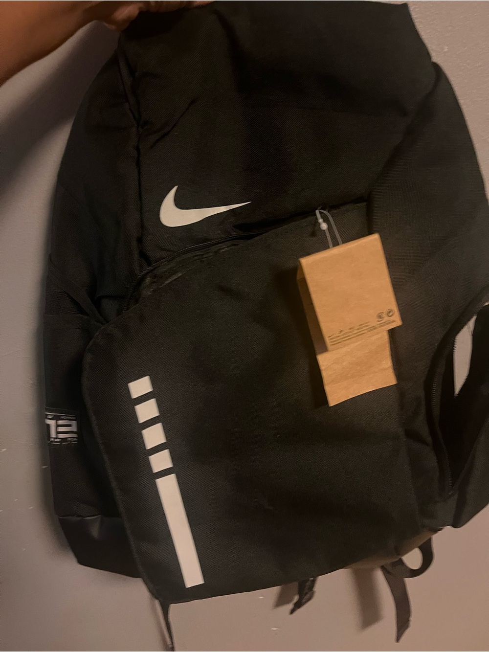 Nike Black Backpack with White Swoosh and Reflective Accents